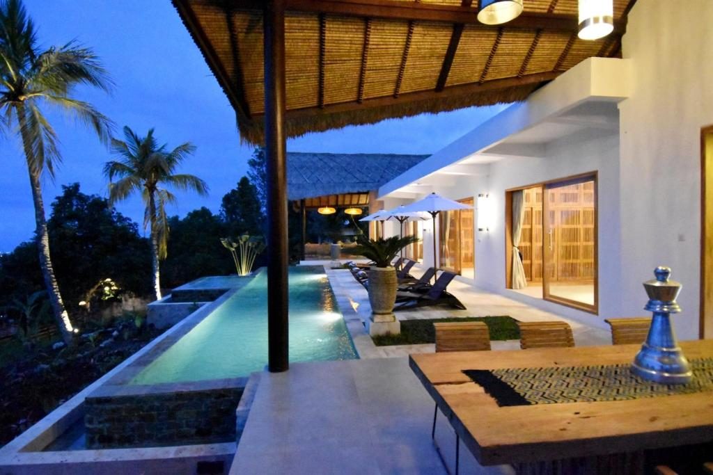 Bali Mimpi luxurious villa with great ocean views! - Three-Bedroom Villa — photo 3
